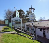 Gaststätte "Zum Bizzenbachtal" Auf dem Foto ist der Eingang der Gaststätte "Zum Bizzenbachtal" in Wehrheim zu sehen.